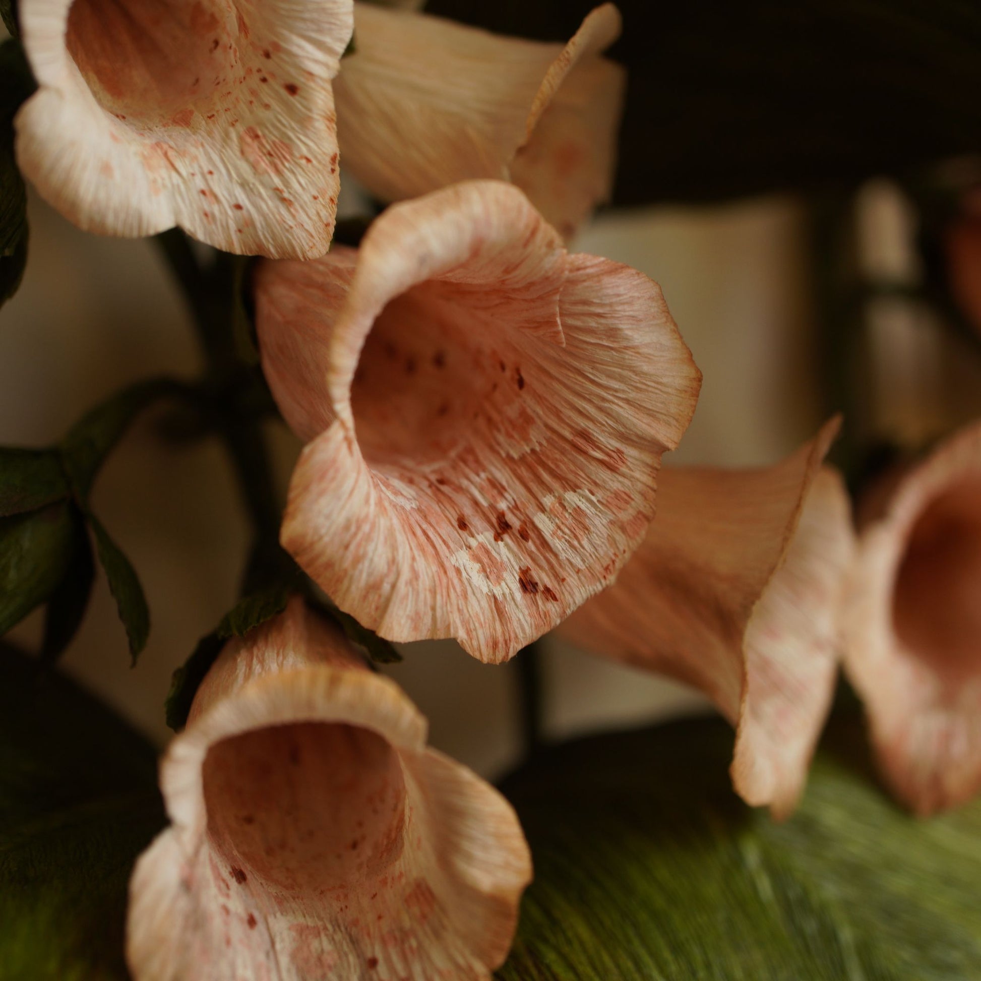 Close up of paper foxglove petals showing fine texture and hand painted detail
