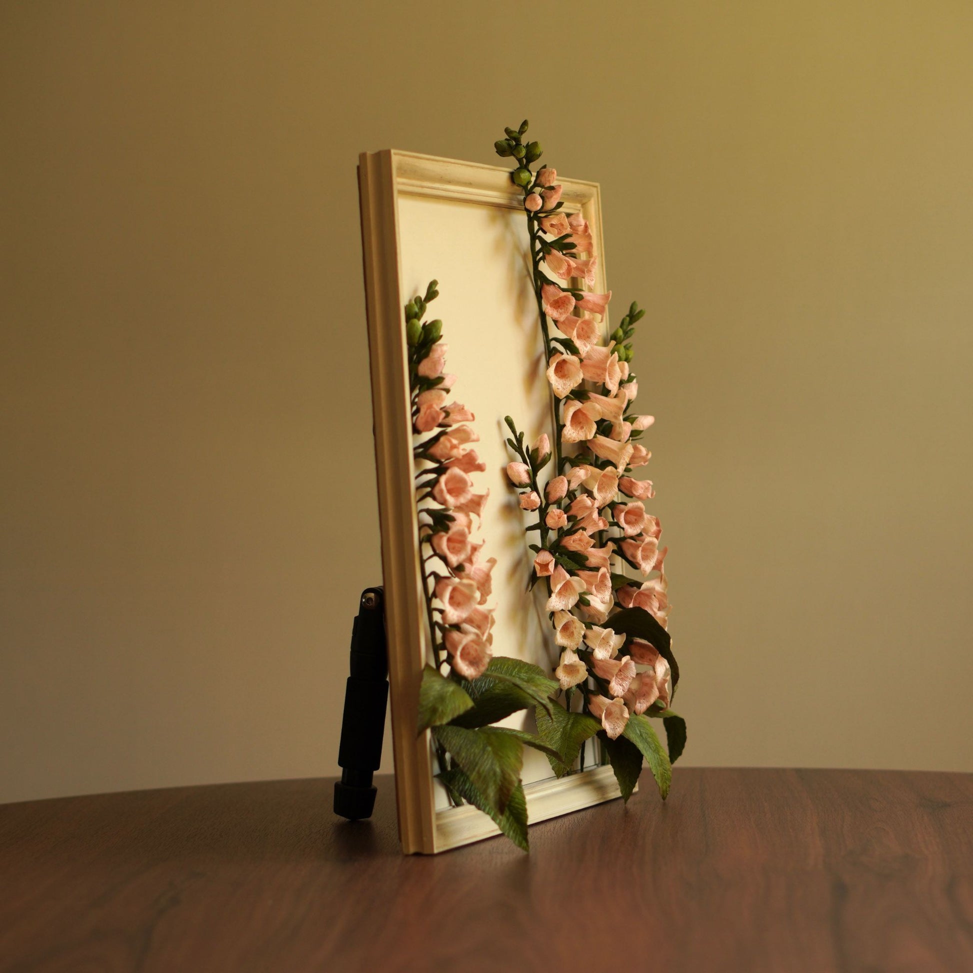 Side profile of framed foxglove paper botanical artwork showing dimensional construction